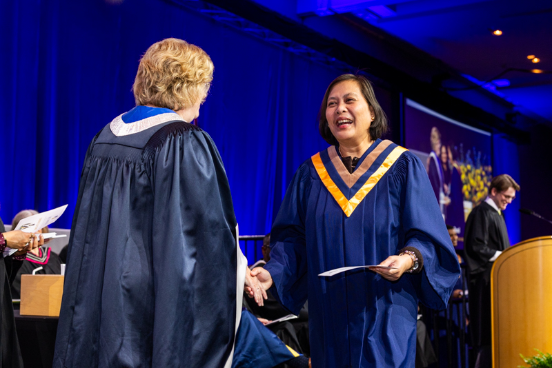 Student receiving diploma