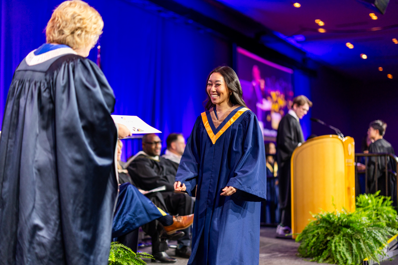 Student receiving diploma