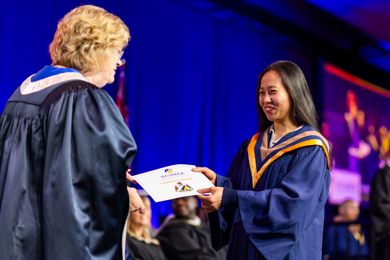 Student receiving diploma