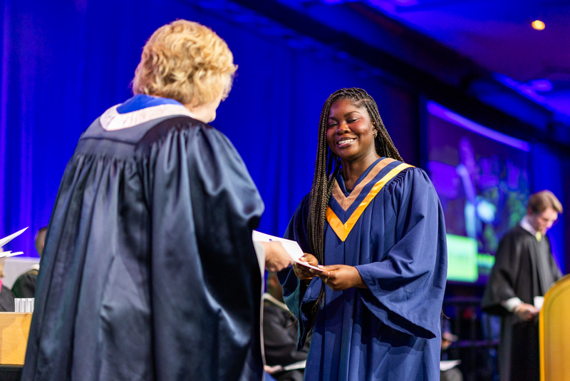 Student receiving diploma