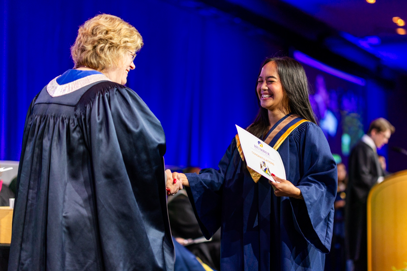 Student receiving diploma