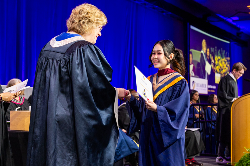Student receiving diploma