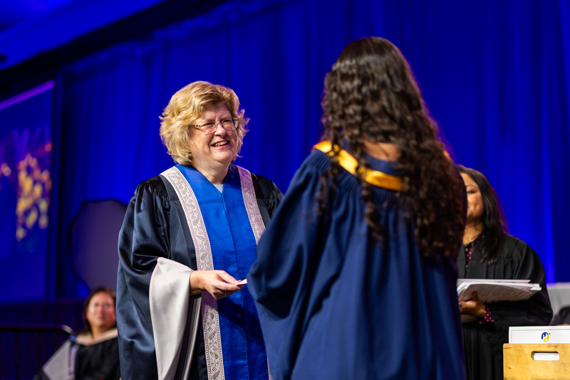 Humber President giving diploma