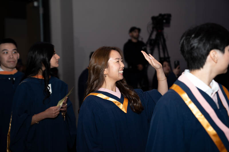 Students smiling in line