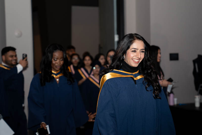 Students smiling in line