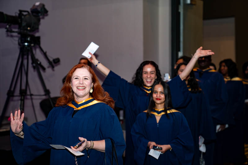 Students smiling in line