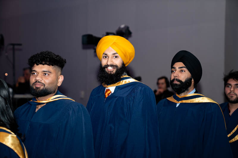 Students smiling in line