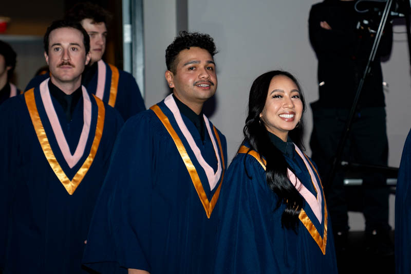 Students smiling in line