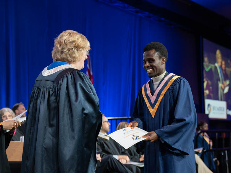 Student receiving diploma