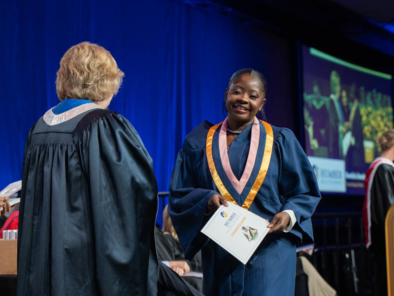 Student receiving diploma