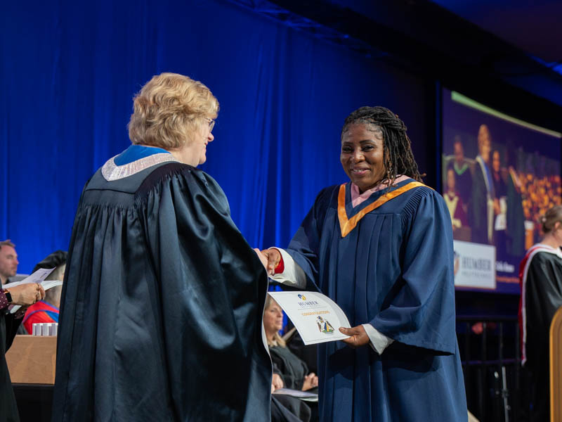 Student receiving diploma