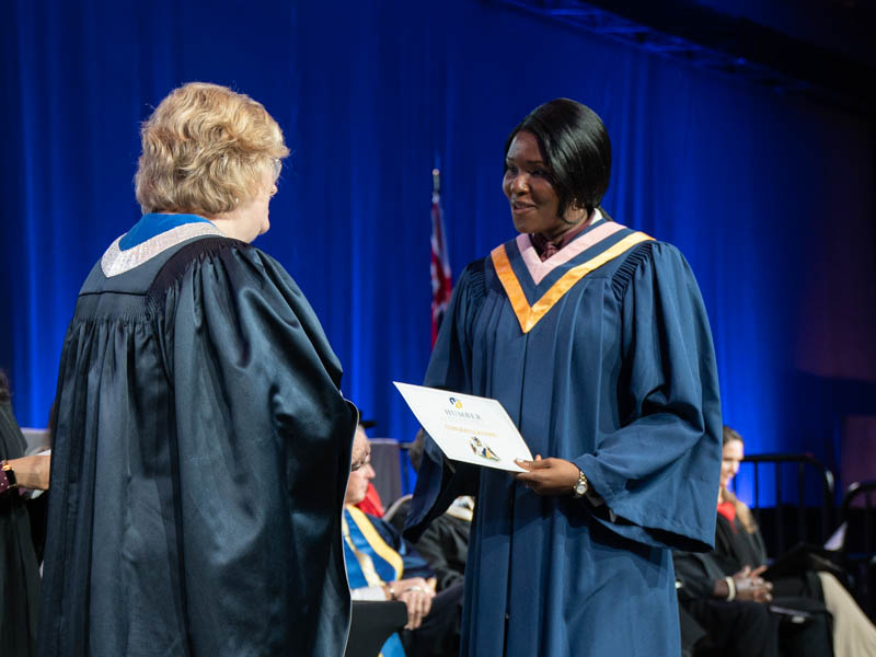 Student receiving diploma