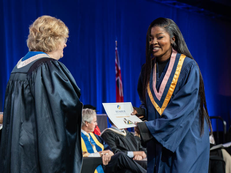 Student receiving diploma