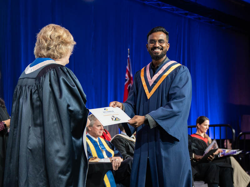 Student receiving diploma