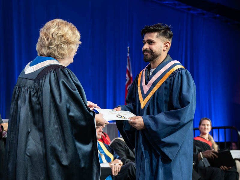 Student receiving diploma