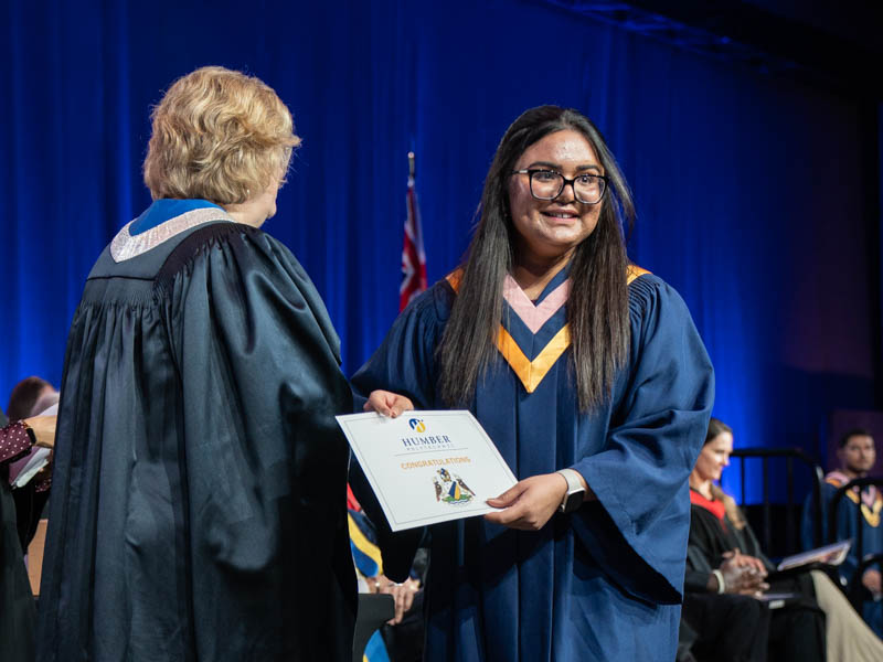 Student receiving diploma