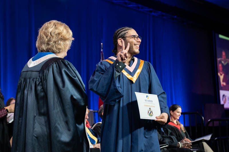 Student receiving diploma