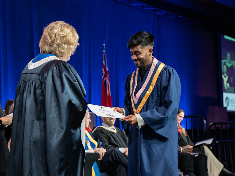 Student receiving diploma