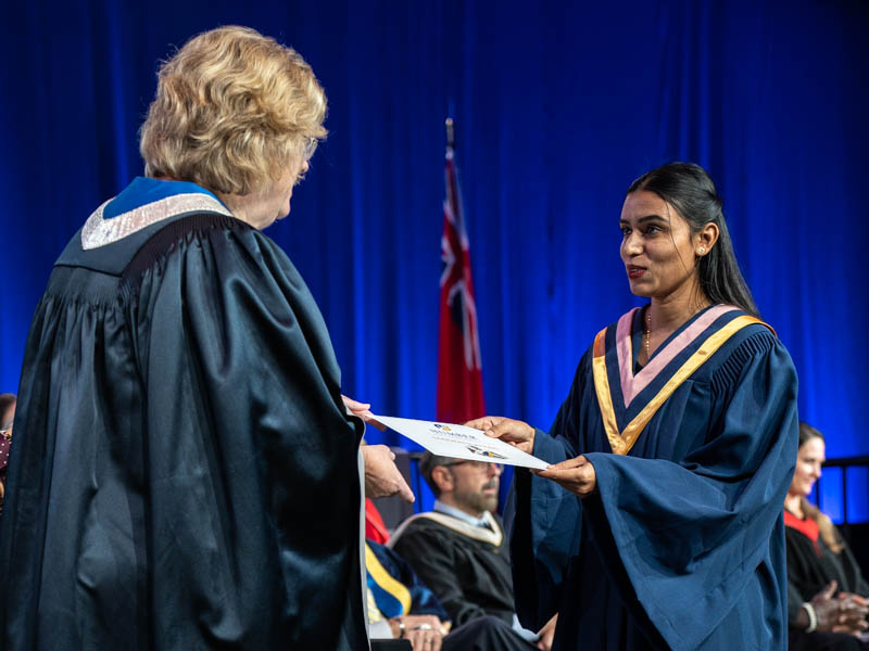 Student receiving diploma
