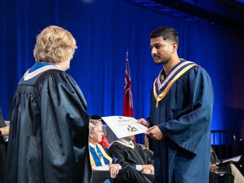 Student receiving diploma