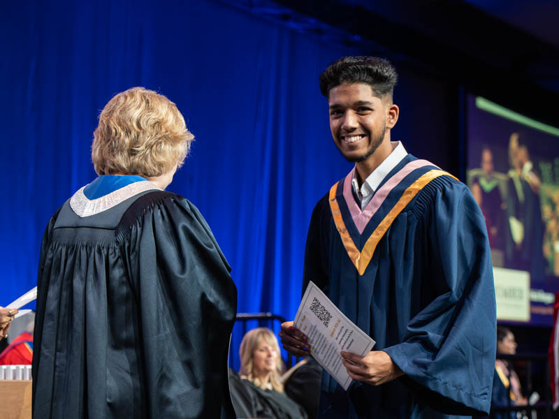 Student receiving diploma