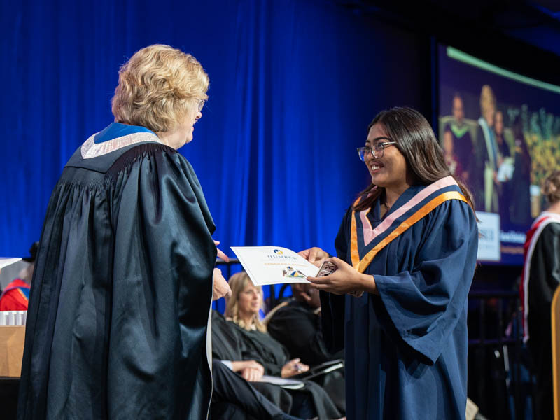Student receiving diploma