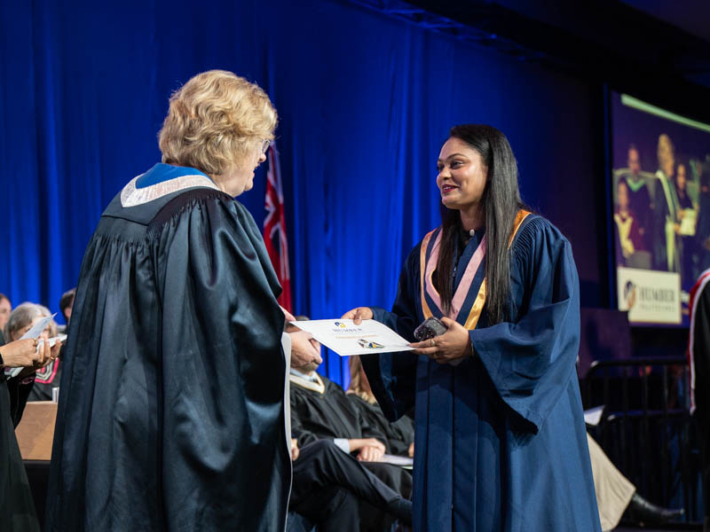 Student receiving diploma