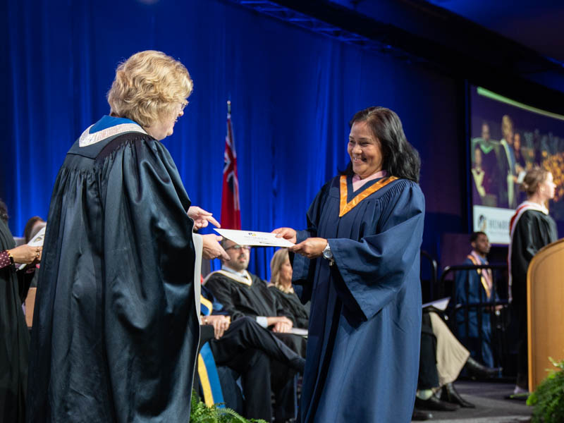 Student receiving diploma