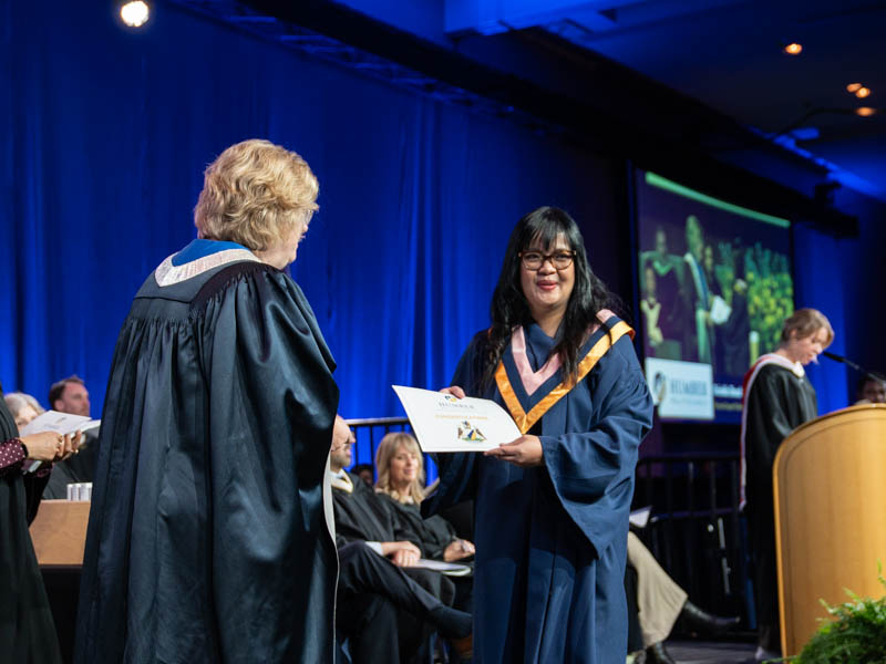 Student receiving diploma