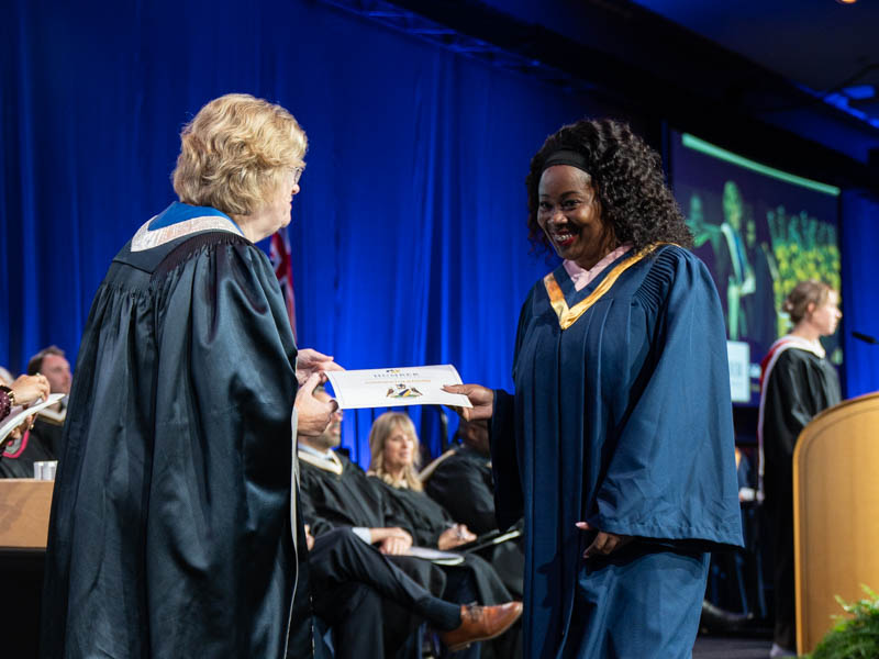 Student receiving diploma