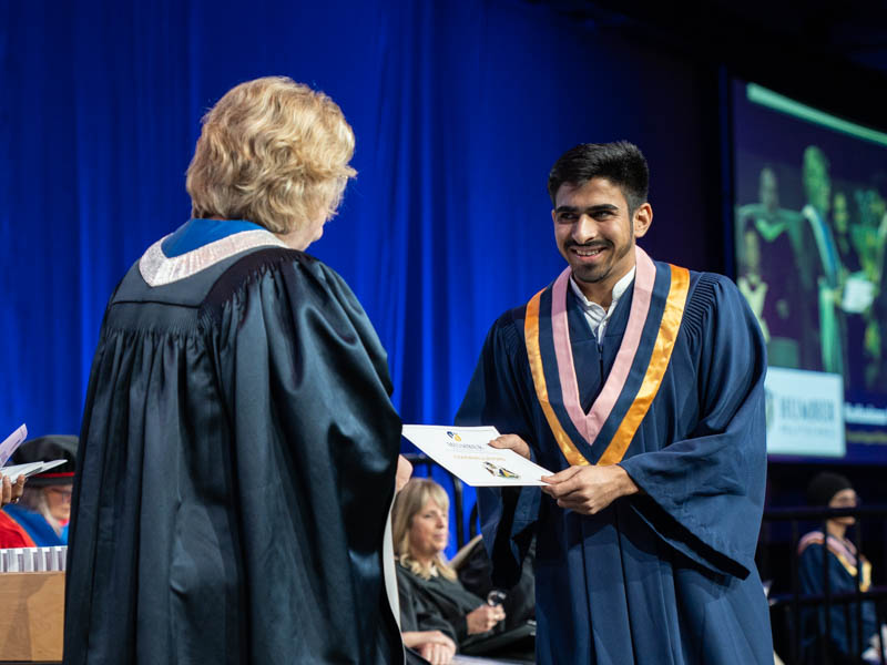 Student receiving diploma
