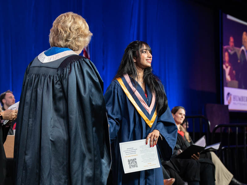 Student receiving diploma