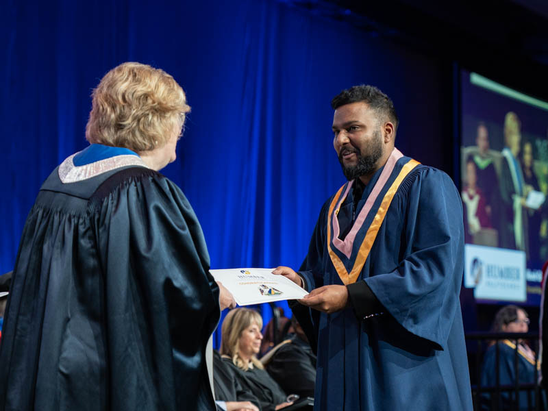 Student receiving diploma