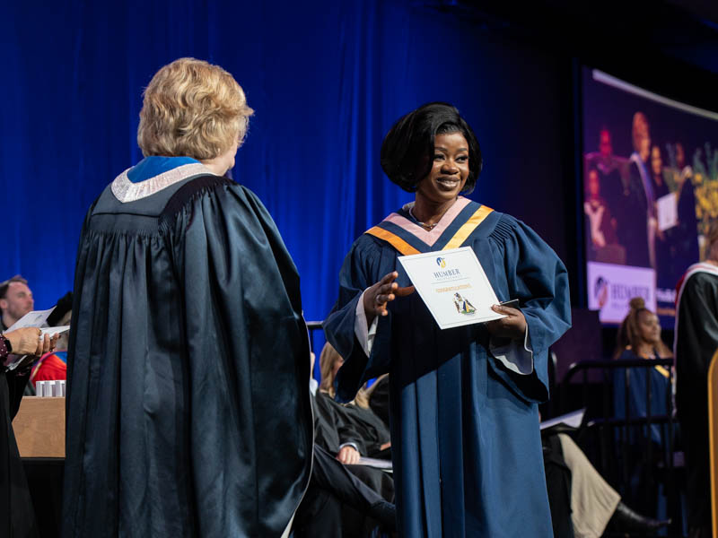Student receiving diploma