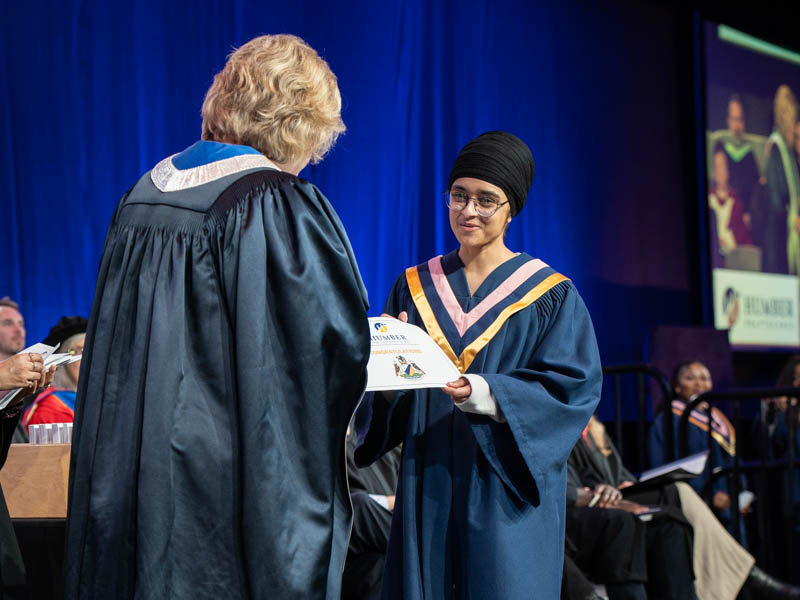Student receiving diploma