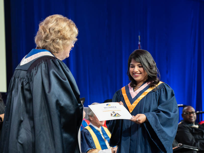 Student receiving diploma