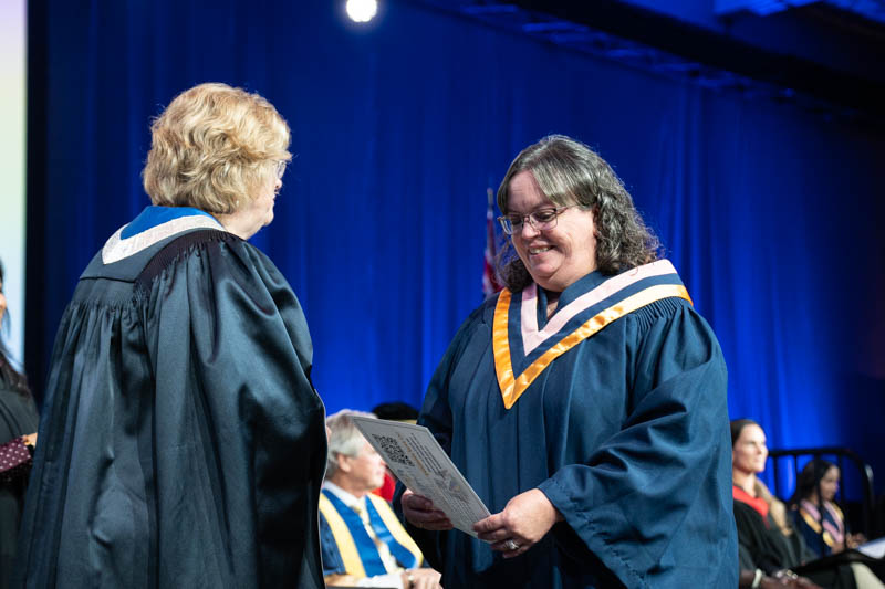 Student receiving diploma
