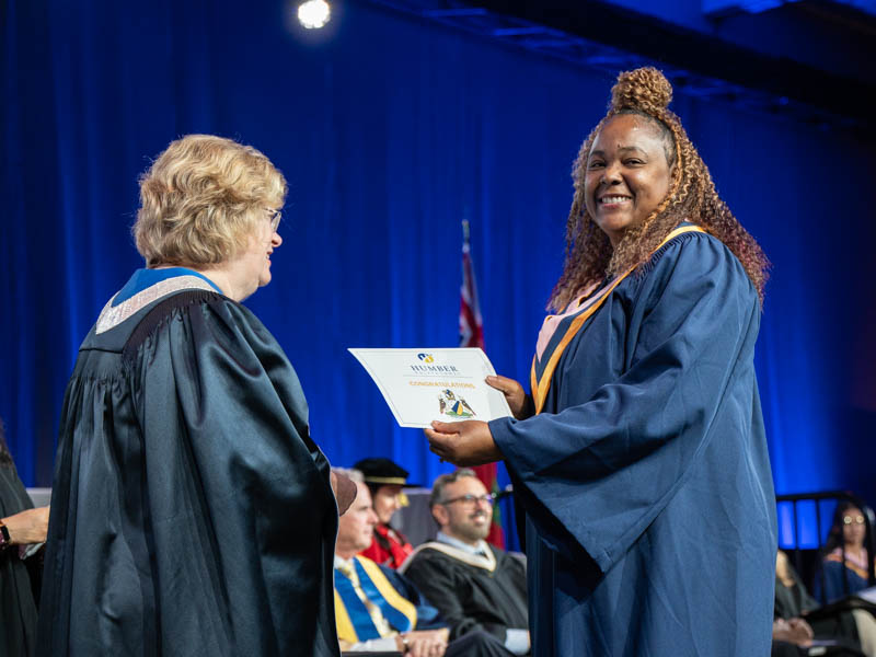 Student receiving diploma