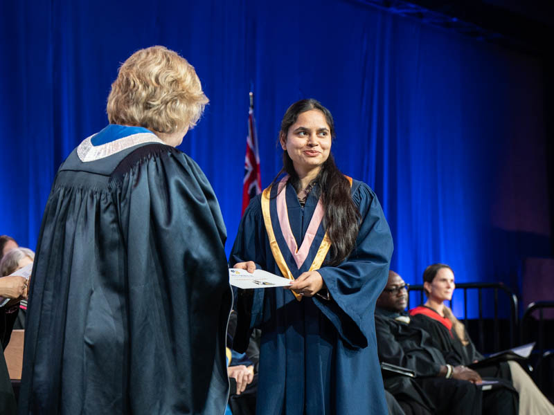 Student receiving diploma