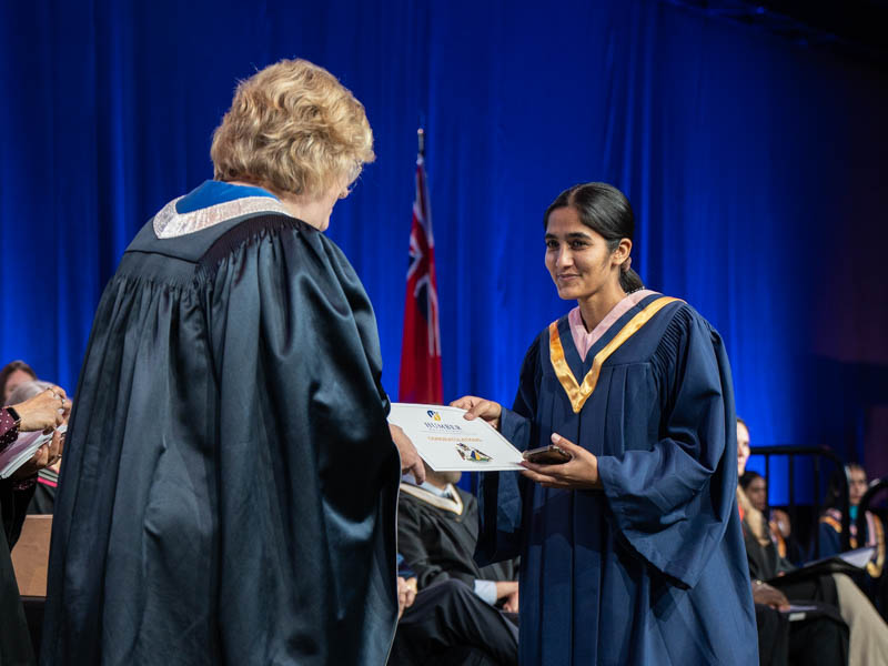 Student receiving diploma