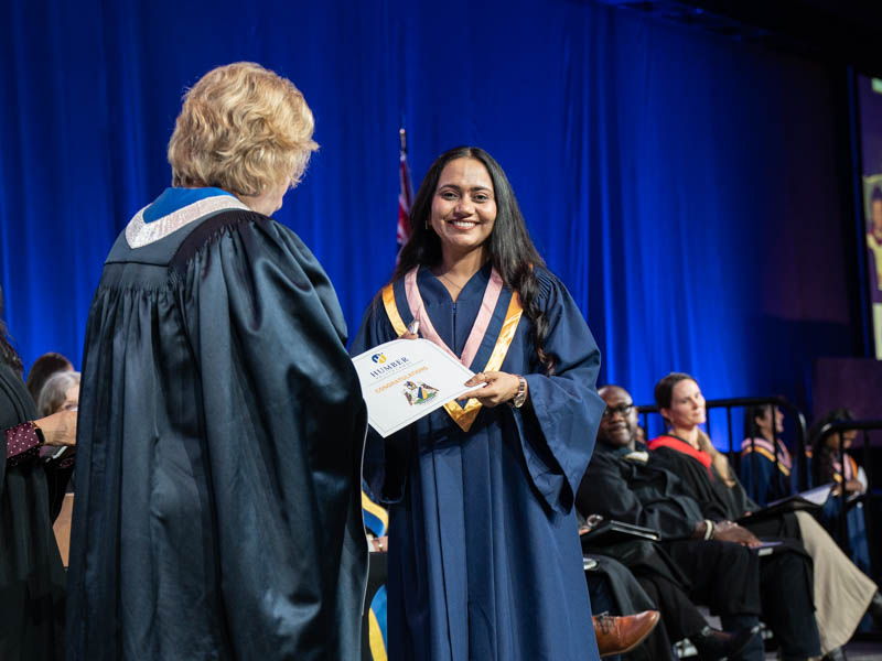 Student receiving diploma