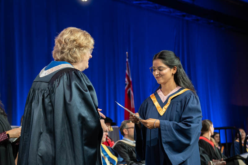 Student receiving diploma