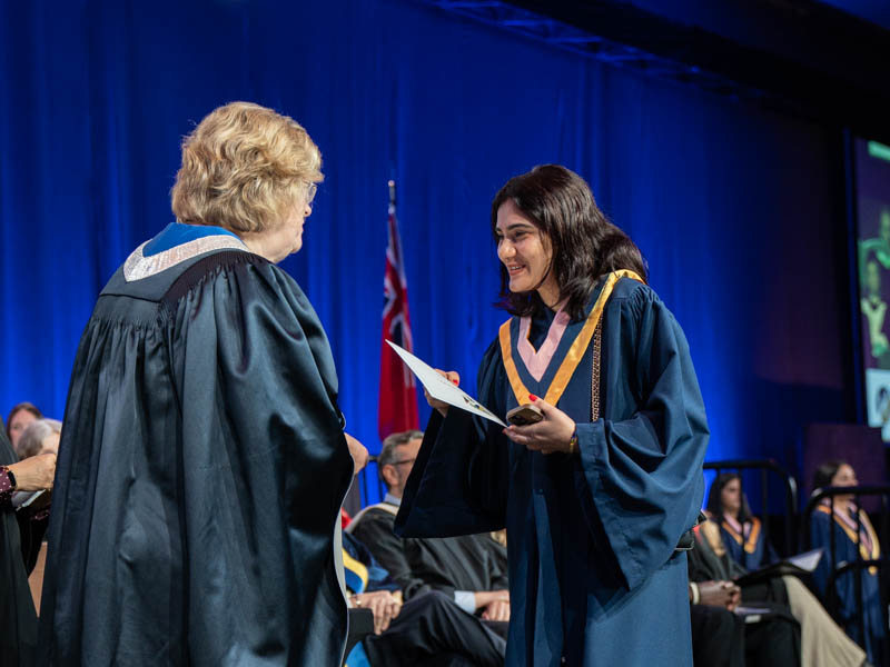 Student receiving diploma