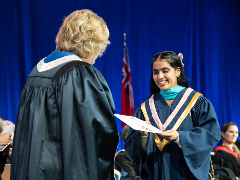 Student receiving diploma