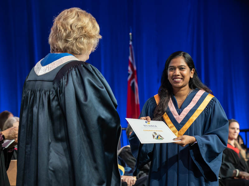 Student receiving diploma