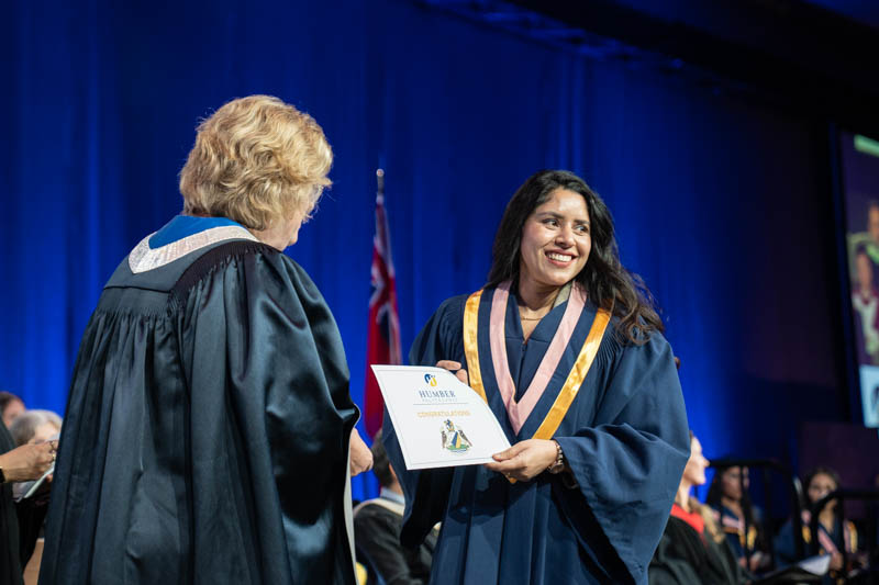 Student receiving diploma