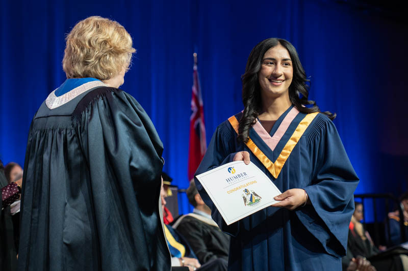 Student receiving diploma
