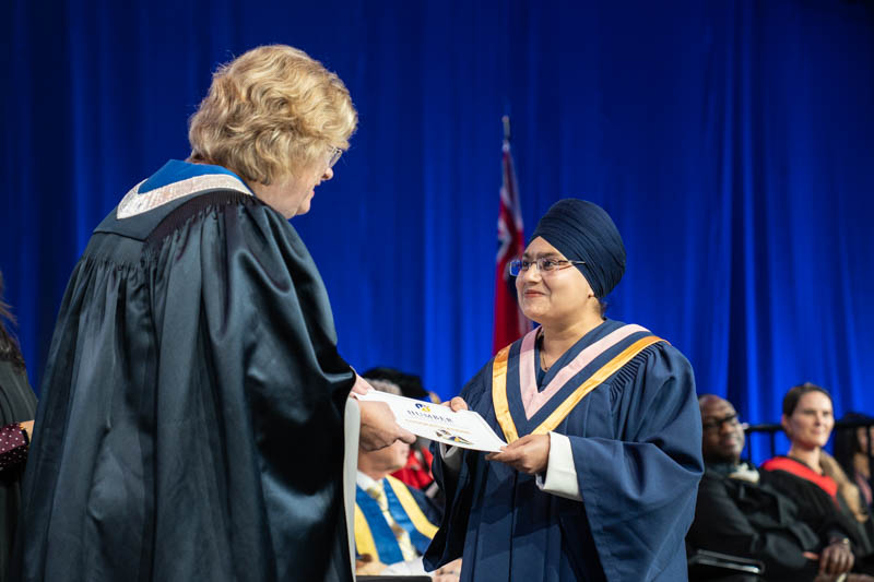 Student receiving diploma