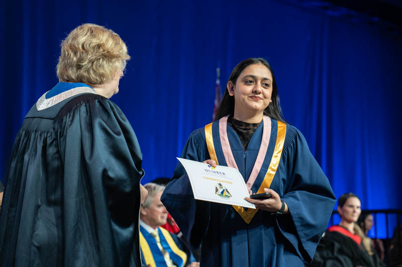 Student receiving diploma