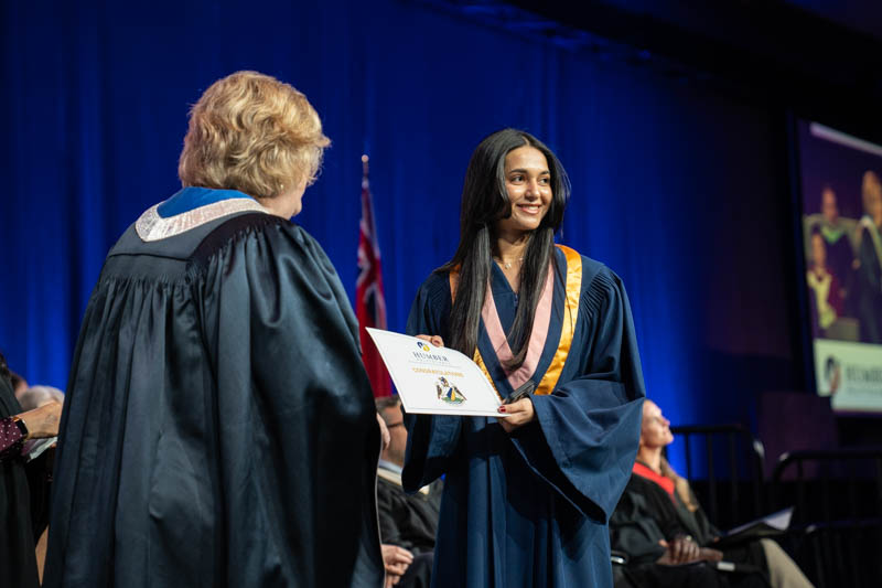 Student receiving diploma
